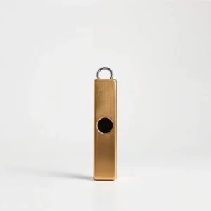 TinkerTail Silent Dog Training Whistle Brass, professional studio product photo on a white background.