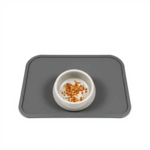 NimbleNest Recycled Rubber Feeding Mat 50 × 35cm, professional studio product photo on a white background.