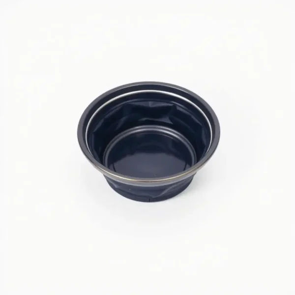 TrailPaws Stainless Steel Collapsible Travel Bowl 700ml, professional studio product photo on a white background.